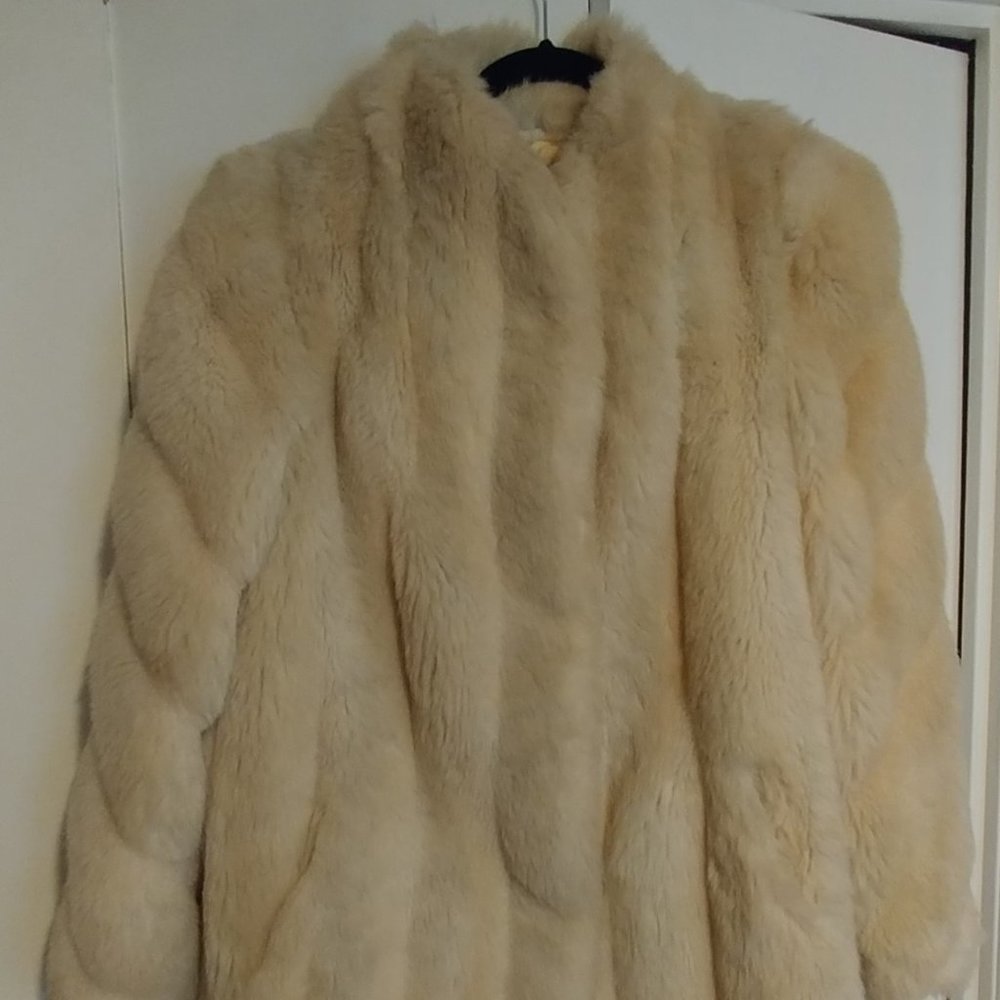 Beautiful creamy white women's faux fur coat